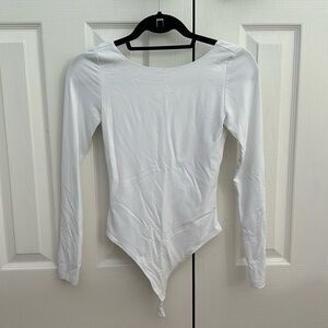 Babaton white long sleeve bodysuit